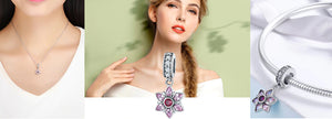 Collection of elegant pink pendants for necklace or charm bracelet.