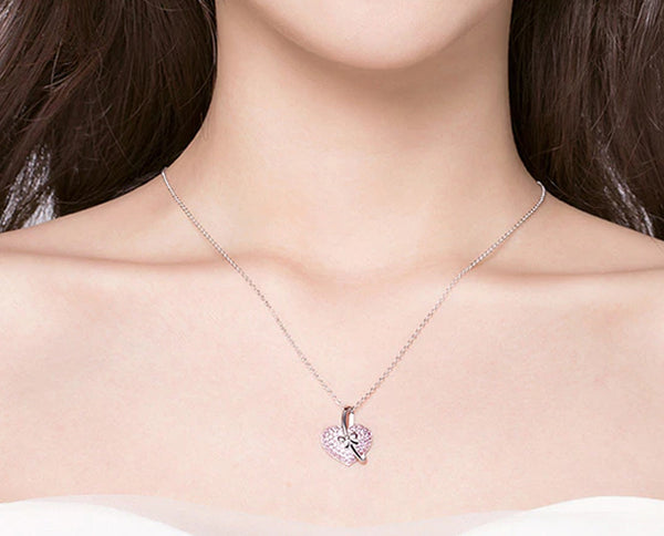 Necklace: Sterling Silver Luminous Pink CZ Bow Knot Necklace