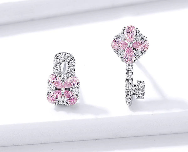 Earring: Sterling Silver Pink Flower Lock and Key Earring